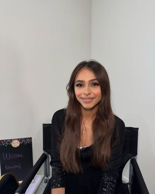 Smiling client after a soft glam makeover