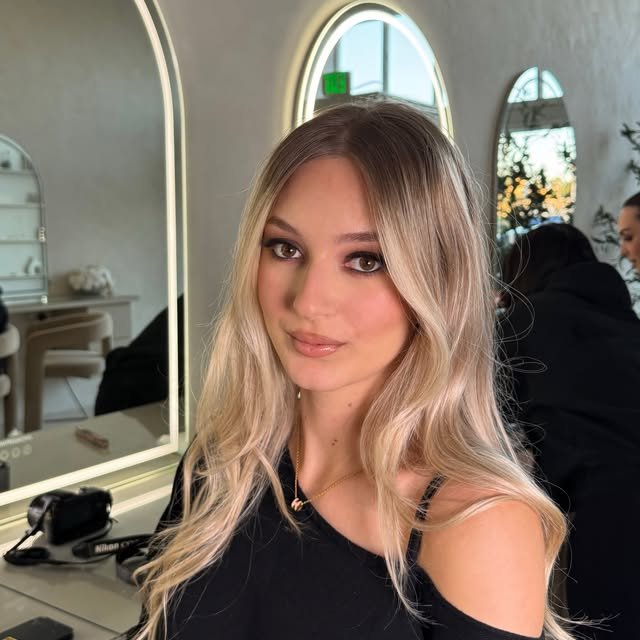 Soft glam makeup on a blonde client